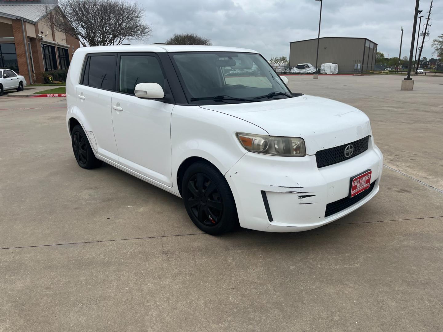 2009 white /black Scion xB Wagon (JTLKE50E591) with an 2.4L L4 DOHC 16V engine, Automatic transmission, located at 14700 Tomball Parkway 249, Houston, TX, 77086, (281) 444-2200, 29.928619, -95.504074 - Photo#0